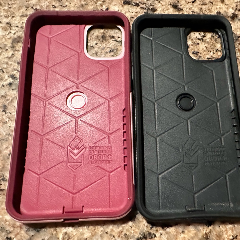 Two iPhone 11 Pro Max commuter otter box cases.